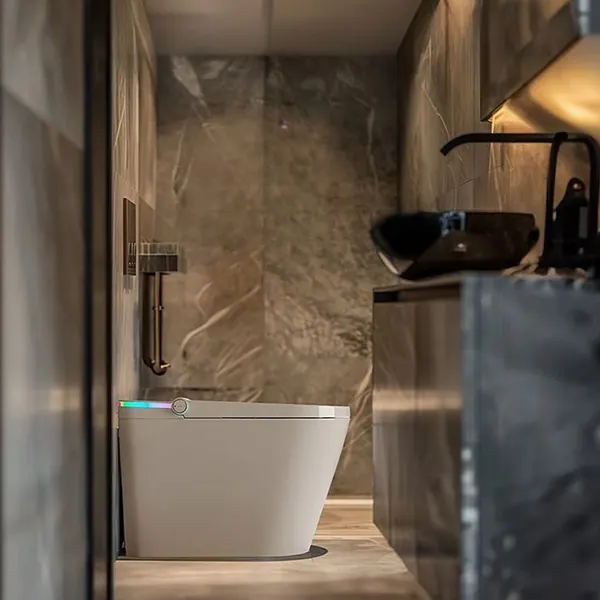 Floor-standing smart toilet with night light in a bathroom with dark walls